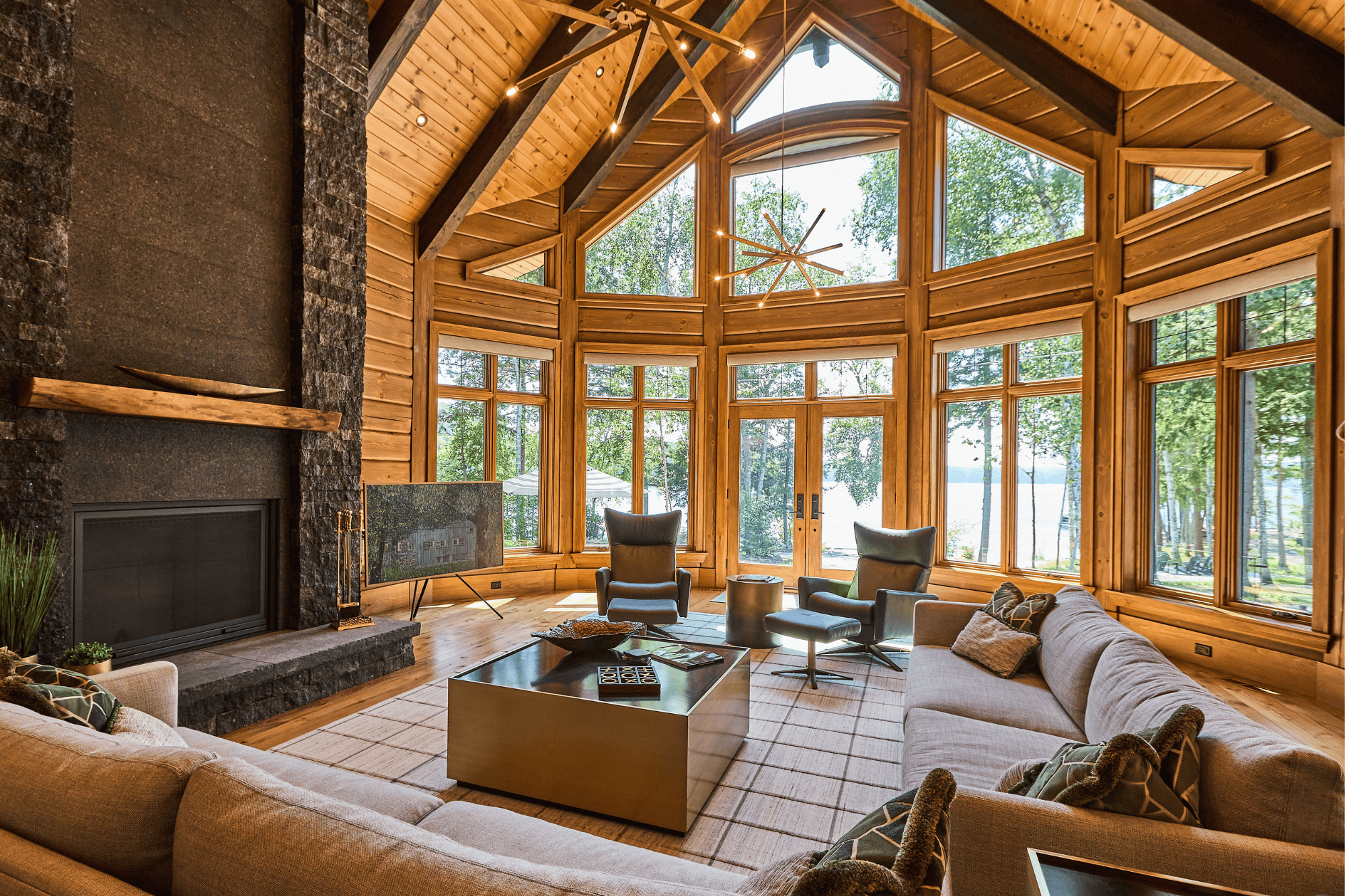 This is the great room of True North Log & Timber Homes’s award-winning Colantonio Residence. This home celebrates clean lines, natural textures, and sunlight to create a grand space defined by timeless sophistication.